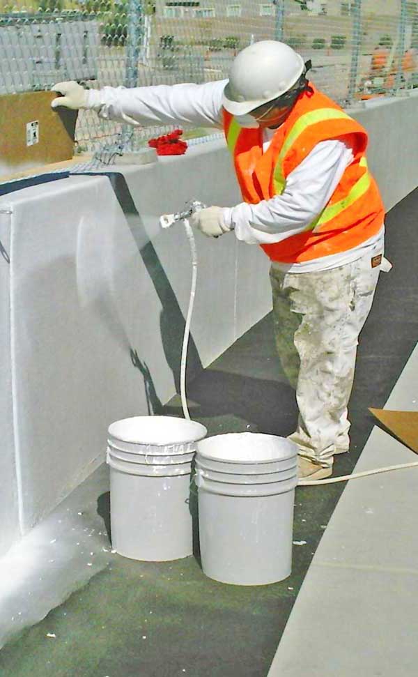 photo-Industrial-Paint-Worker-painting-guard-rail