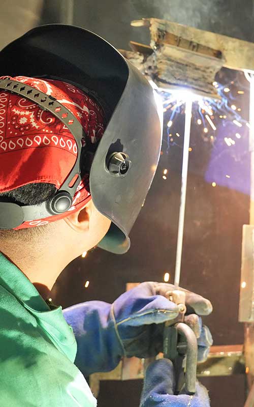 slider-photo-of-apprentice-welding